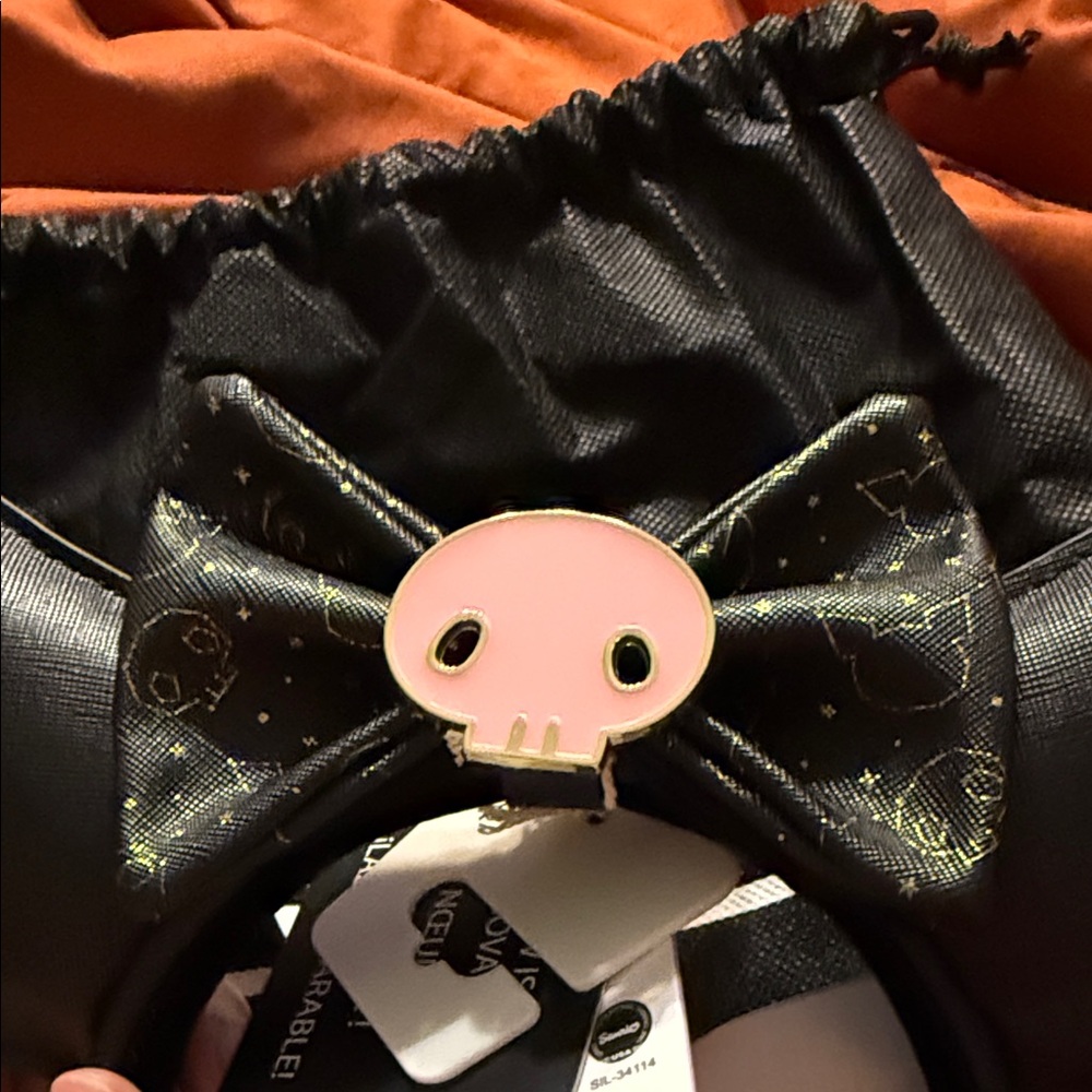 Loungefly Kuromi Black Faux-Leather Cat Ear Headband with Pink Skull Bow - Picture 3 of 7
